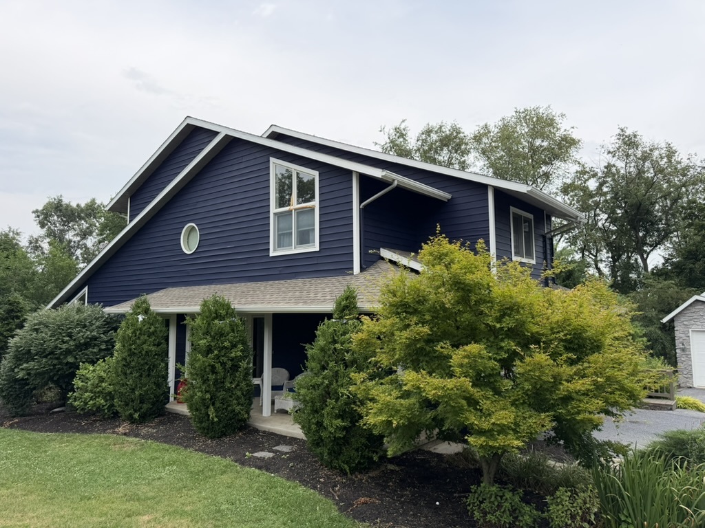 Exterior house painting in deep navy blue — Awe Paint Lititz PA